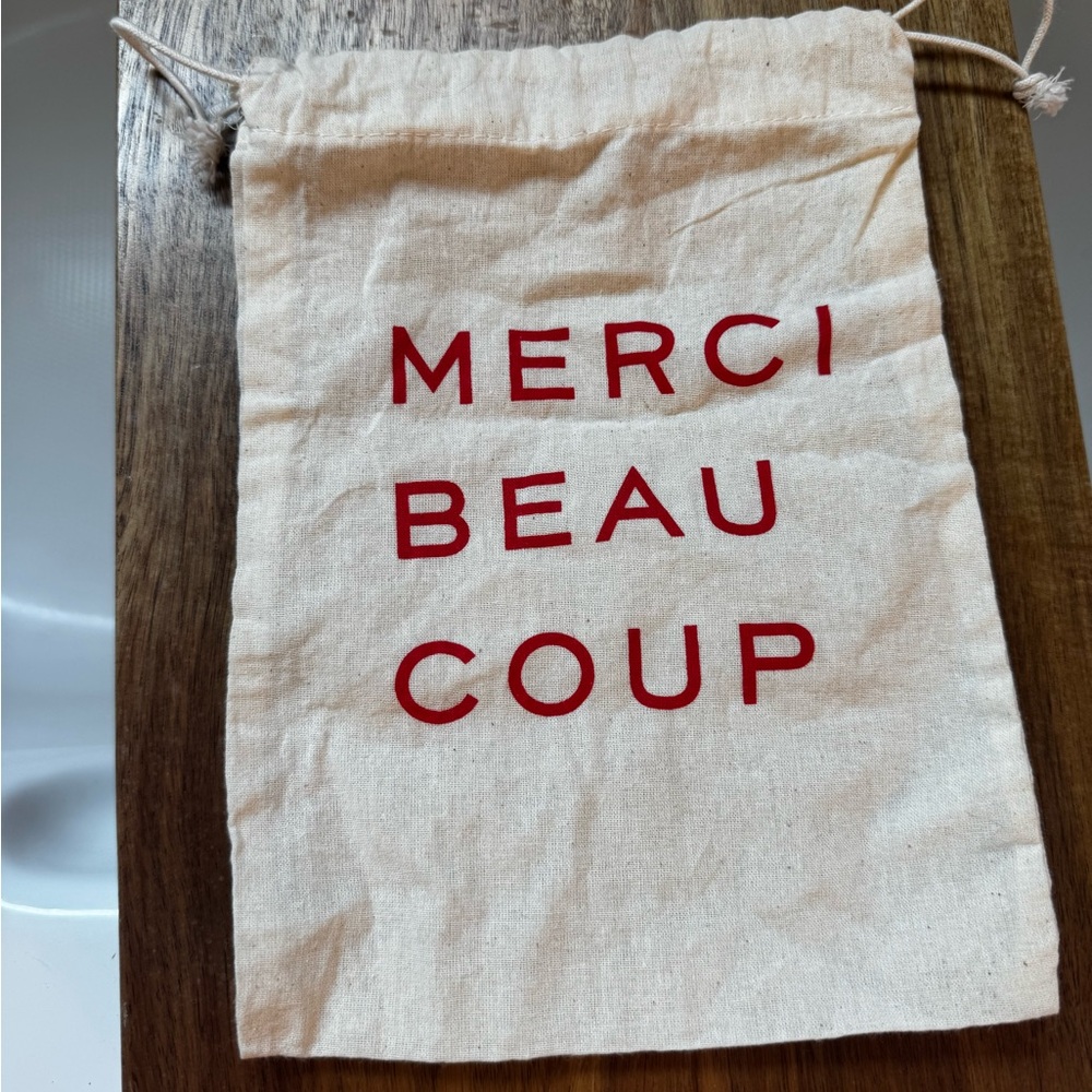 Merci Beaucoup Drawstring Bag